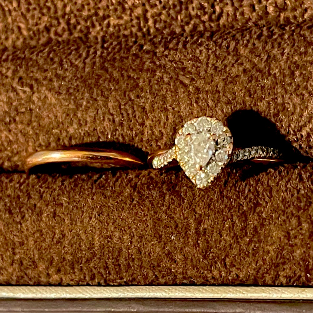3/8 ct tw pear-shaped diamond frame twist engagement and band in 10K gold rose
